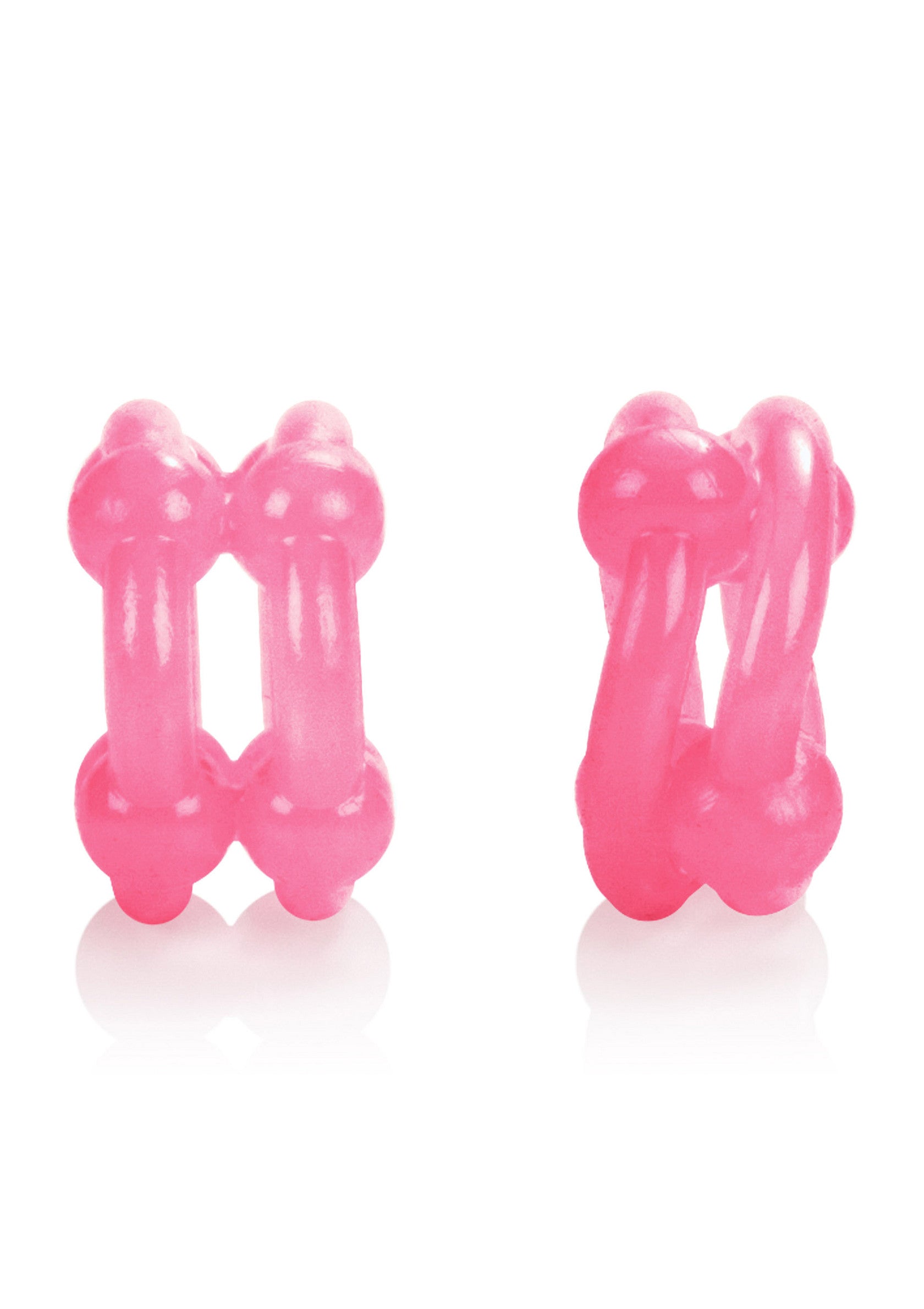 Deux anneaux de pénis roses pour le plaisir érotique et le sexe.; Twee roze penisringen voor erotisch genot en seks.; Two pink penis rings for erotic pleasure and sex.