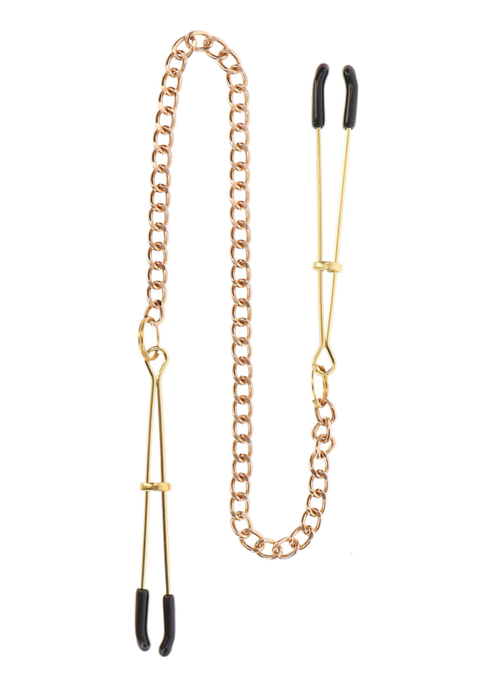 Pinces à tétons dorées avec chaîne. Accessoires pour adultes, jeux coquins.; Gouden tepelklemmen met ketting. Volwassen accessoires voor ondeugende spelletjes.; Gold nipple clamps with chain. Adult accessories for kinky games.