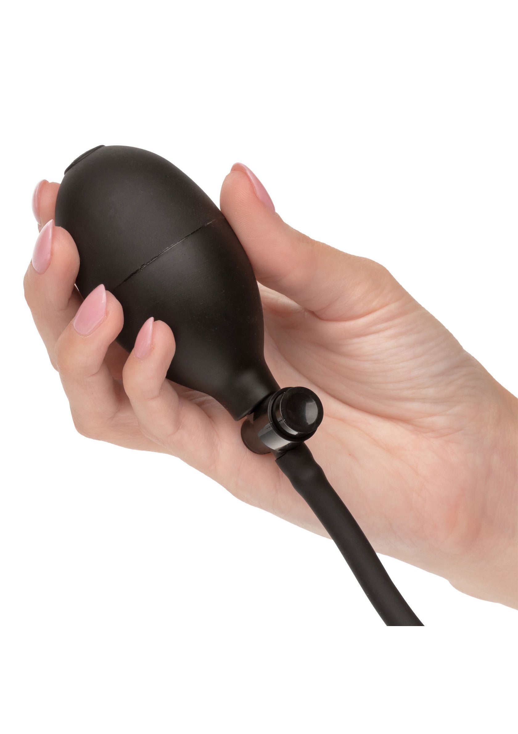 Poire de lavement noire en main pour une hygiène intime douce et efficace.; Zwarte klysma peer in de hand voor zachte en effectieve intieme hygiëne.; Black enema bulb in hand for gentle and effective intimate hygiene.