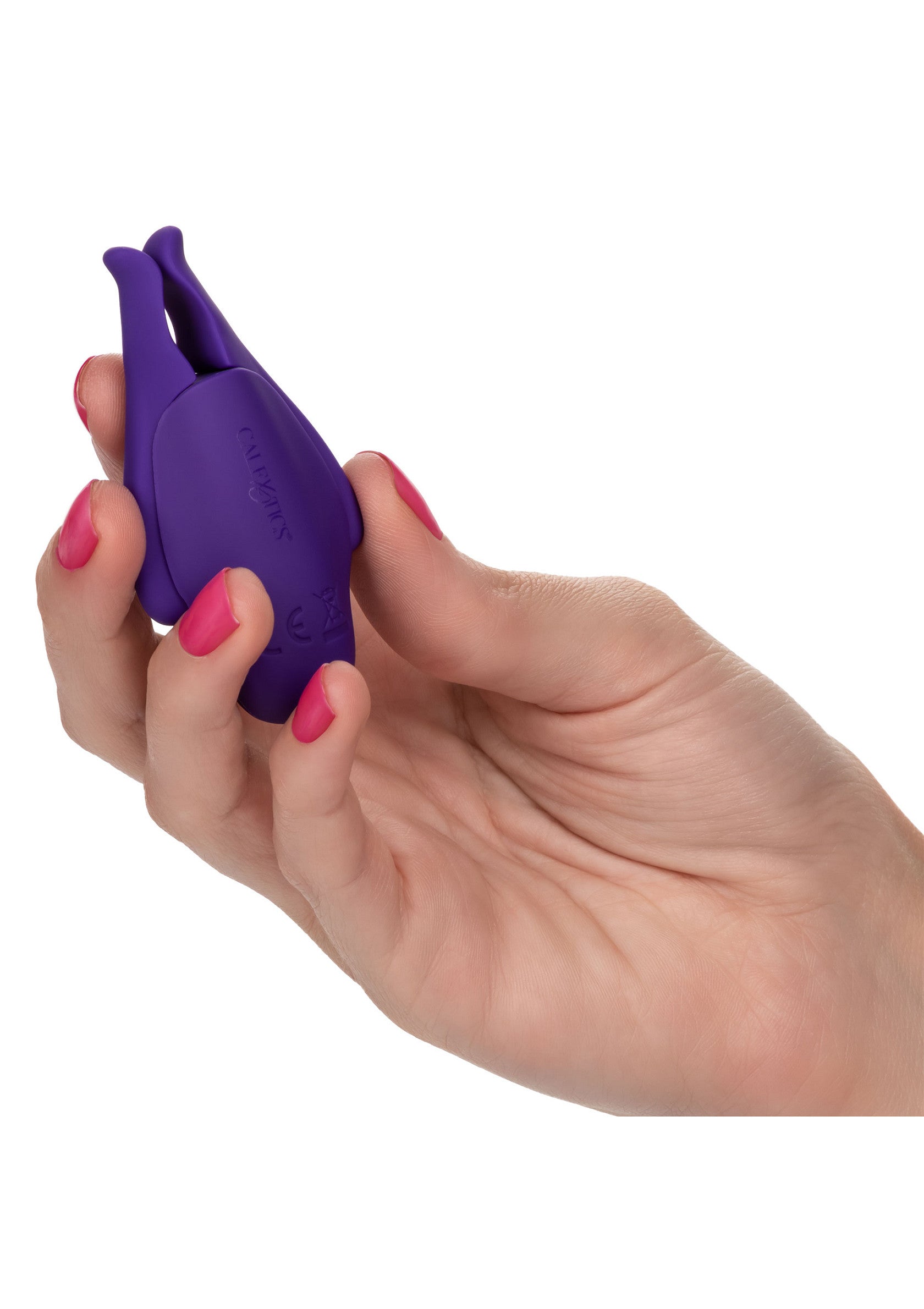Masseur clitoridien violet pour un plaisir intense.; Paarse clitorisstimulator voor intens plezier.; Purple clitoral massager for intense pleasure.