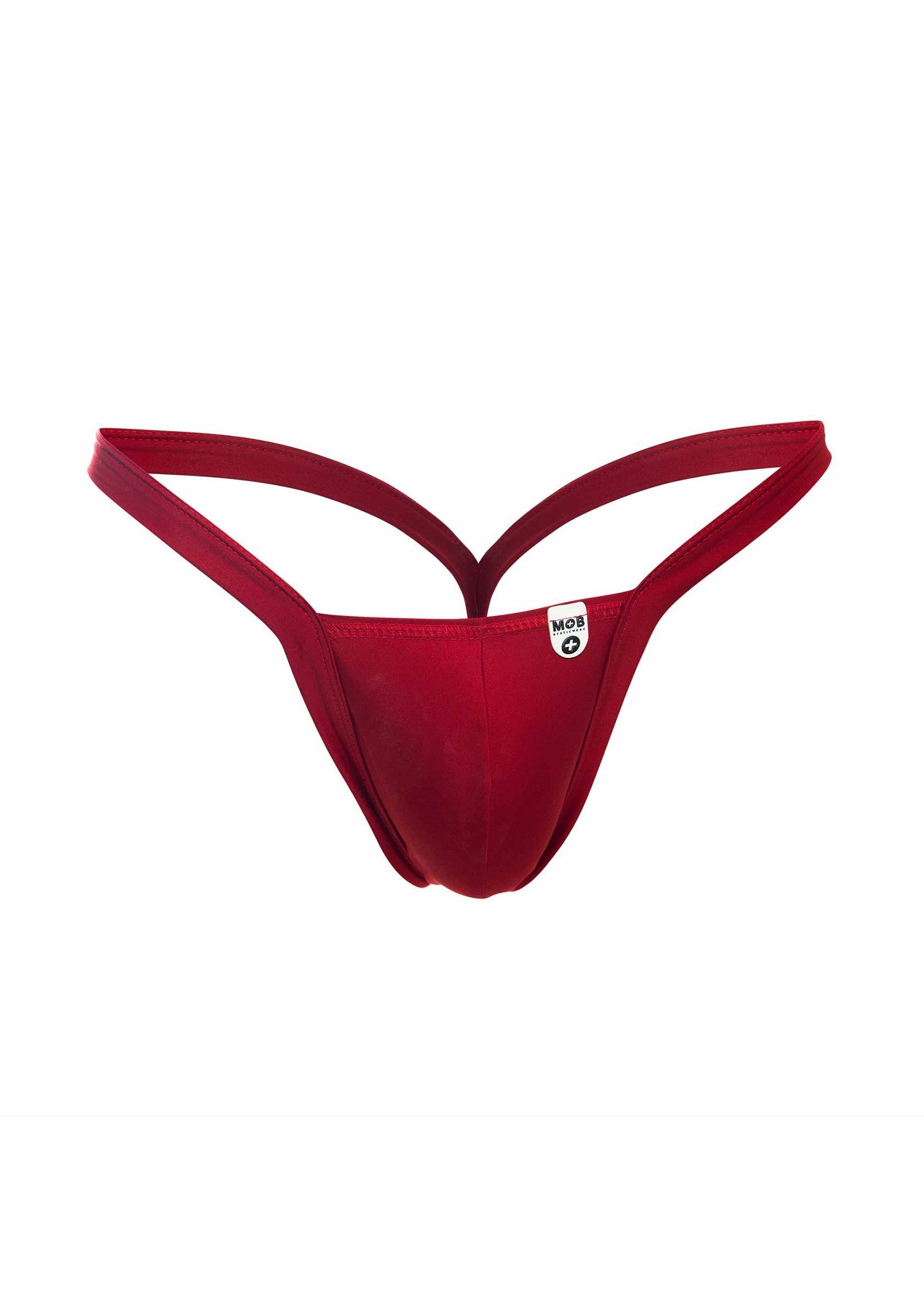 String rouge pour homme, élégant et confortable. Sous-vêtement minimaliste pour un look séduisant.; Rode herenstring, elegant en comfortabel. Minimalistisch ondergoed voor een verleidelijke look.; Red men's thong, elegant and comfortable. Minimalist underwear for a seductive look.