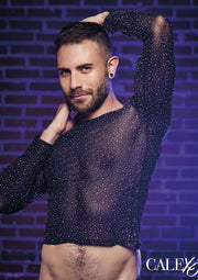 Homme en haut transparent à pois. Mode masculine audacieuse et élégante. Découvrez notre collection !; Man in doorzichtige top met stippen. Gedurfde en stijlvolle herenmode. Bekijk onze collectie!; Man in sheer polka dot top. Bold & stylish men's fashion. Shop our collection!