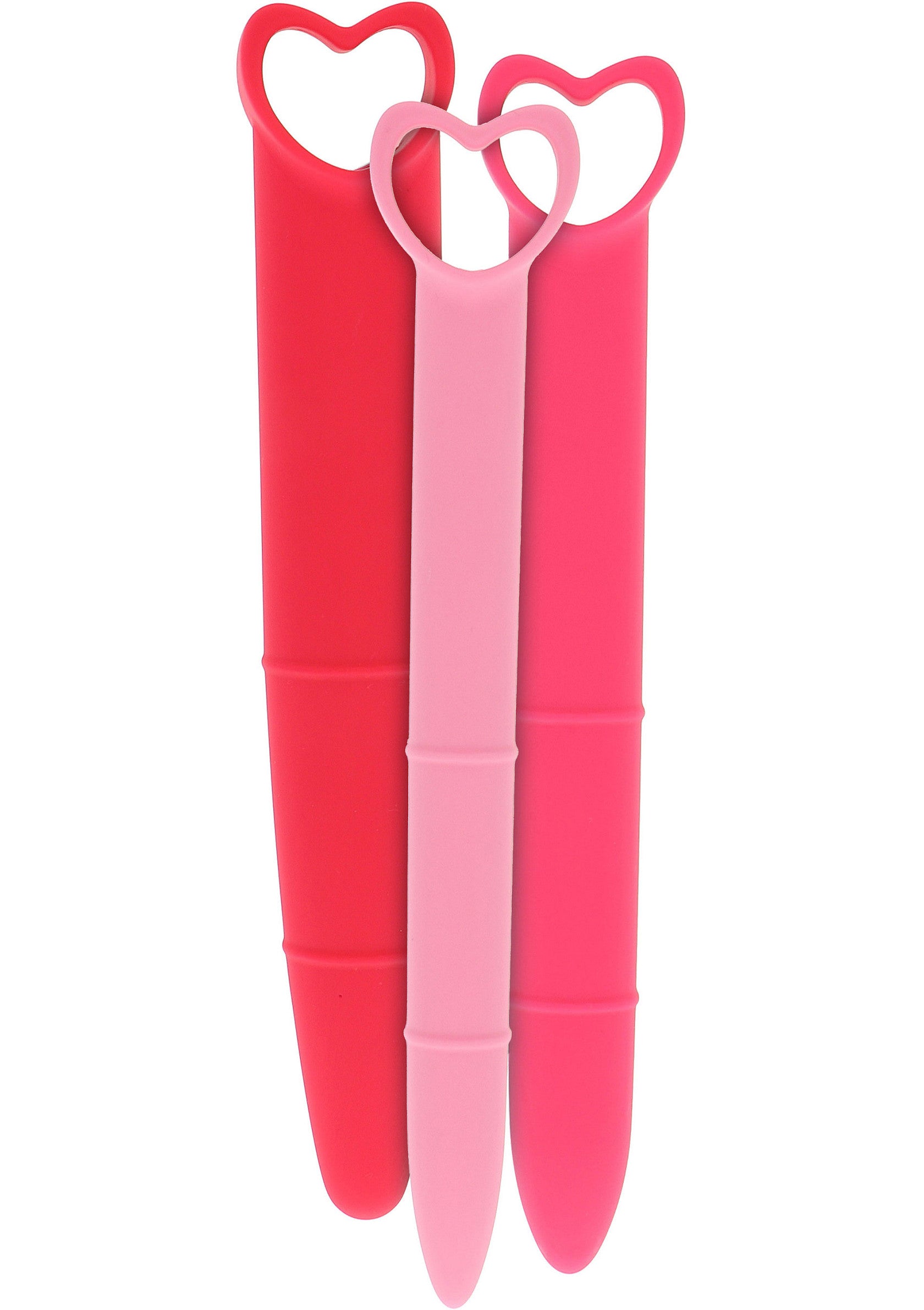 Jouets roses et rouges en forme de cœur pour adultes.; Roze en rode speeltjes in hartvorm voor volwassenen.; Pink and red heart-shaped toys for adults.