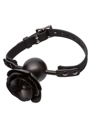 Bâillon boule noir orné d'une rose, parfait pour le bondage et les jeux de soumission. Élégant et audacieux.; Zwarte knevel met roos, perfect voor bondage en onderwerping spelletjes. Elegant en uitdagend.; Black ball gag with rose, perfect for bondage and submission games. Elegant and daring.