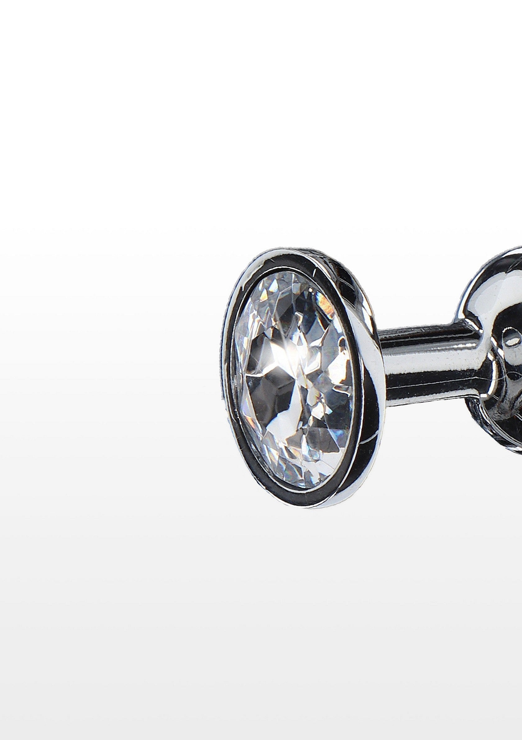 Plug anal orné d'un bijou étincelant pour une touche de luxe et de plaisir.; Anale plug versierd met een sprankelend juweel voor een vleugje luxe en plezier.; Anal plug adorned with a sparkling jewel for a touch of luxury and pleasure.