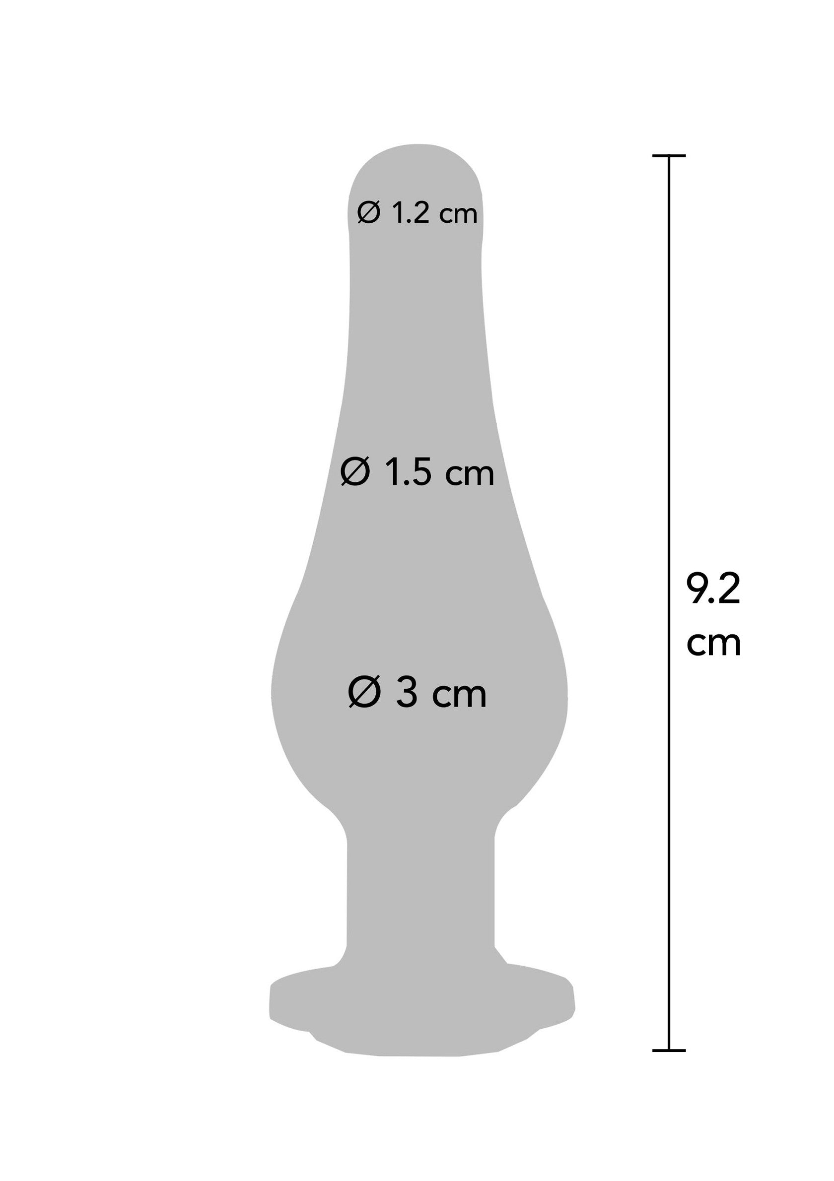 Diagramme des dimensions d'un plug anal. Longueur 9,2 cm, diamètre allant de 1,2 cm à 3 cm.; Diagram met de afmetingen van een anale plug. Lengte 9,2 cm, diameter van 1,2 cm tot 3 cm.; Diagram showing the dimensions of an anal plug. Length 9.2 cm, diameter ranging from 1.2 cm to 3 cm.