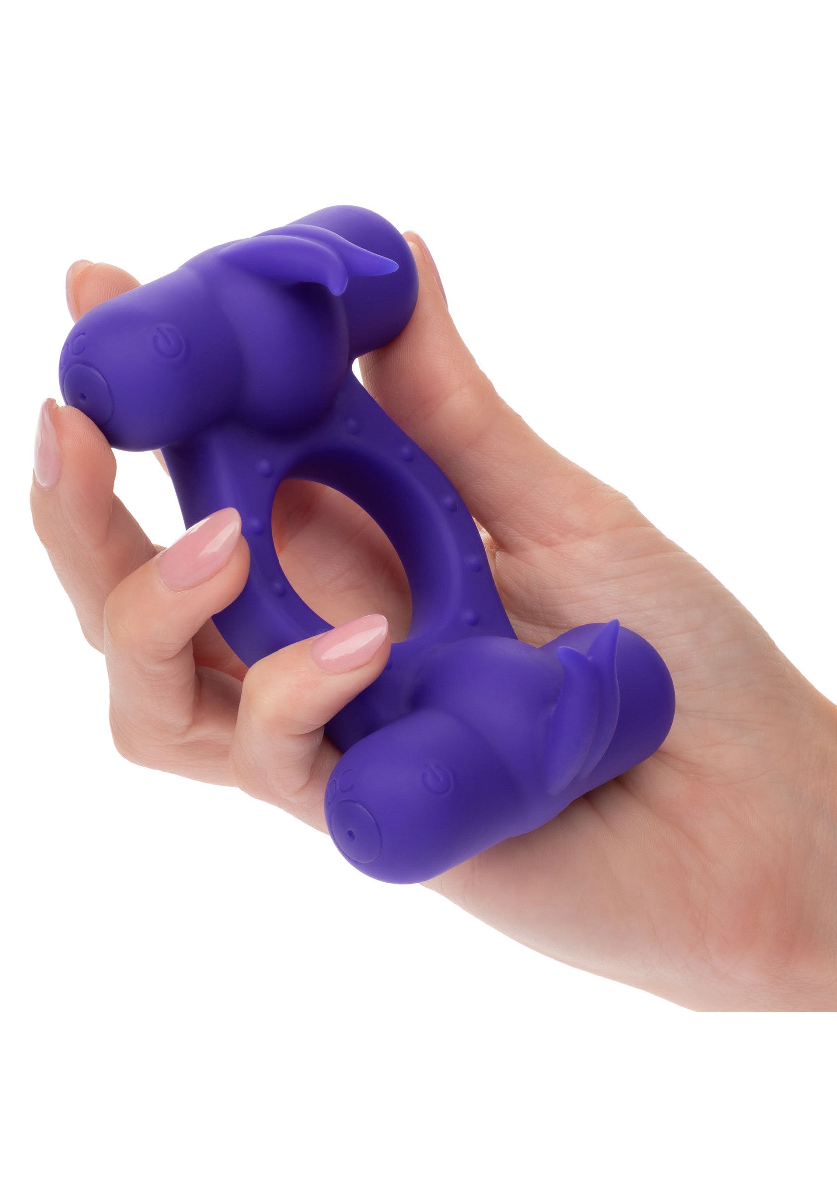 Anneau vibrant violet en forme d'éléphant pour plus de plaisir.; Paarse vibrerende ring in de vorm van een olifant voor extra plezier.; Purple vibrating elephant-shaped ring for added pleasure.