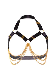 Harnais noir et doré avec chaînes pour une touche audacieuse et élégante.; Zwart en gouden harnas met kettingen voor een gedurfde en elegante touch.; Black and gold harness with chains for a bold and elegant touch.