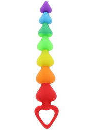 Plug anal arc-en-ciel en forme de cœur pour le plaisir et l'exploration. Jouet adulte coloré.; Regenboog hartvormige anale plug voor plezier en verkenning. Kleurrijk speeltje voor volwassenen.; Rainbow heart-shaped anal plug for pleasure and exploration. Colorful adult toy.