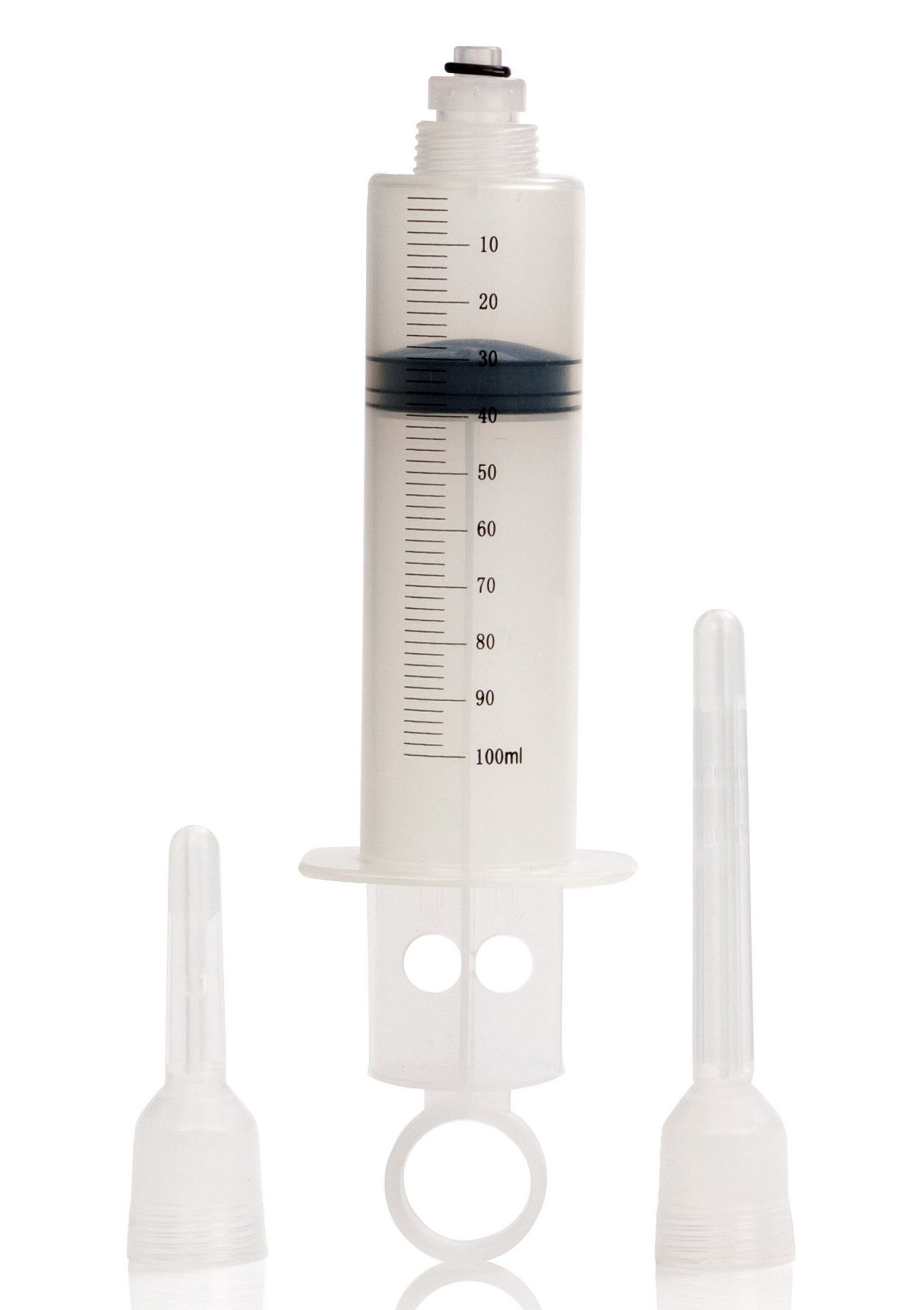 Grosse seringue de 100 ml avec embouts interchangeables pour divers usages.; Grote spuit van 100 ml met verwisselbare opzetstukken voor diverse toepassingen.; Large 100 ml syringe with interchangeable nozzles for various uses.
