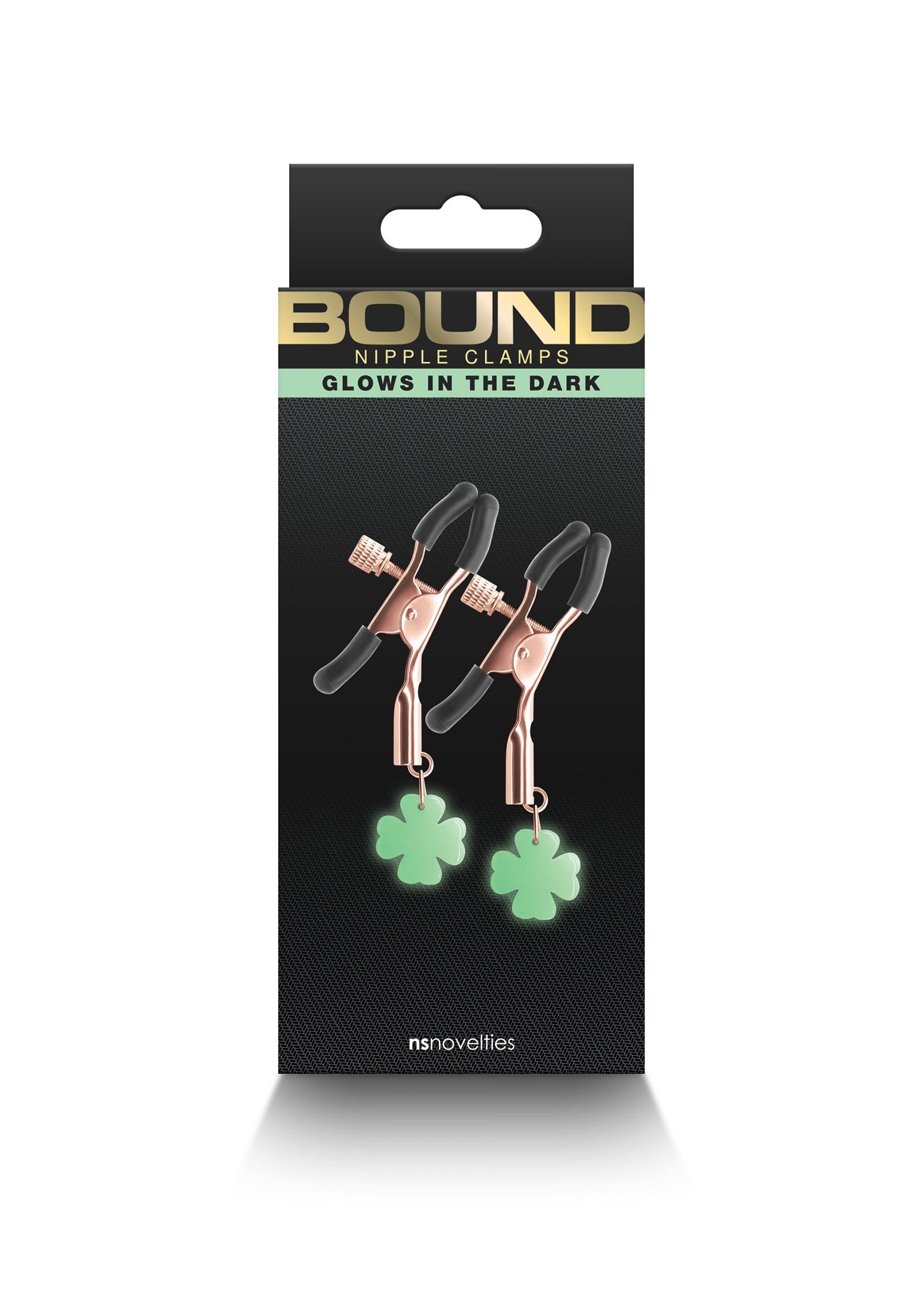 Pinces à tétons BOUND avec trèfles phosphorescents. Pimentez votre vie amoureuse avec ces accessoires coquins.; BOUND tepelklemmen met glow-in-the-dark klavertjes. Piment je liefdesleven met deze ondeugende accessoires.; BOUND nipple clamps with glow-in-the-dark clovers. Spice up your love life with these naughty accessories.