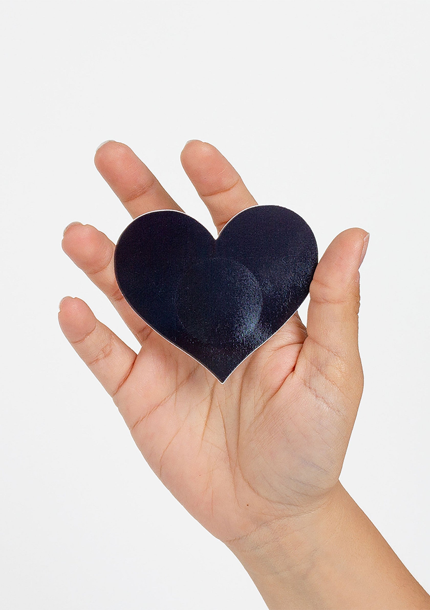 Coeurs noirs en main. Parfait pour la Saint-Valentin ou exprimer votre amour. Découvrez notre sélection de cadeaux romantiques!; Zwarte hartjes in hand. Perfect voor Valentijnsdag of om je liefde te uiten. Bekijk onze selectie romantische cadeaus!; Black hearts in hand. Perfect for Valentine's Day or expressing your love. Check out our selection of romantic gifts!