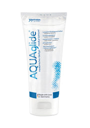 AQUAglide gel lubrifiant médical. Lubrification longue durée, compatible avec les préservatifs. Fabriqué en Allemagne.; AQUAglide medische glijmiddel. Langdurige smering, condoom-compatibel. Made with Love in Germany. ; AQUAglide medical lubricant. Long-lasting lubrication, condom compatible. Made with Love in Germany.