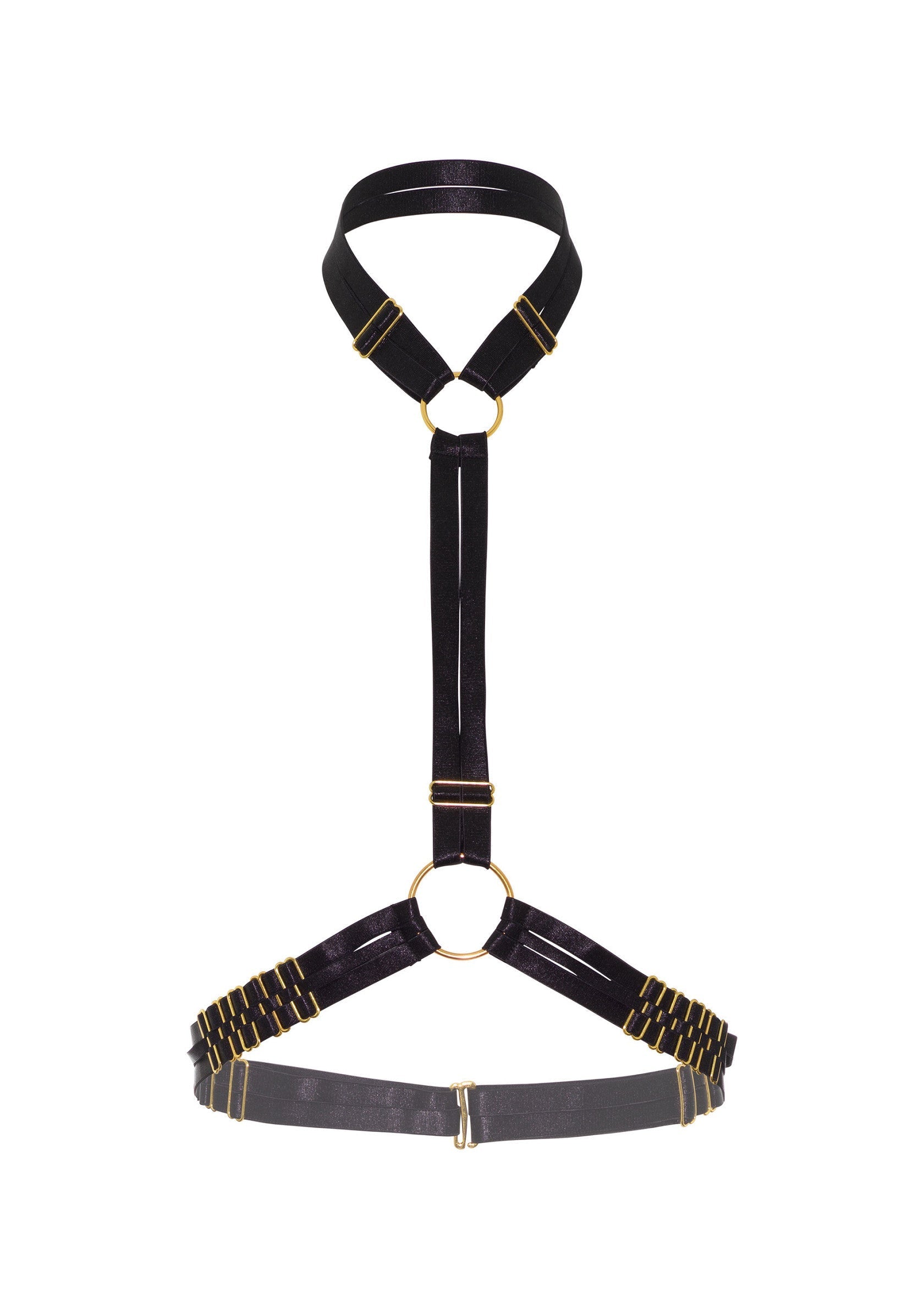 Harnais noir élégant avec des détails dorés. Accessoire de mode audacieux pour une allure sophistiquée.; Stijlvol zwart harnas met gouden details. Een gedurfd modeaccessoire voor een verfijnde look.; Stylish black harness with gold details. A bold fashion accessory for a sophisticated look.