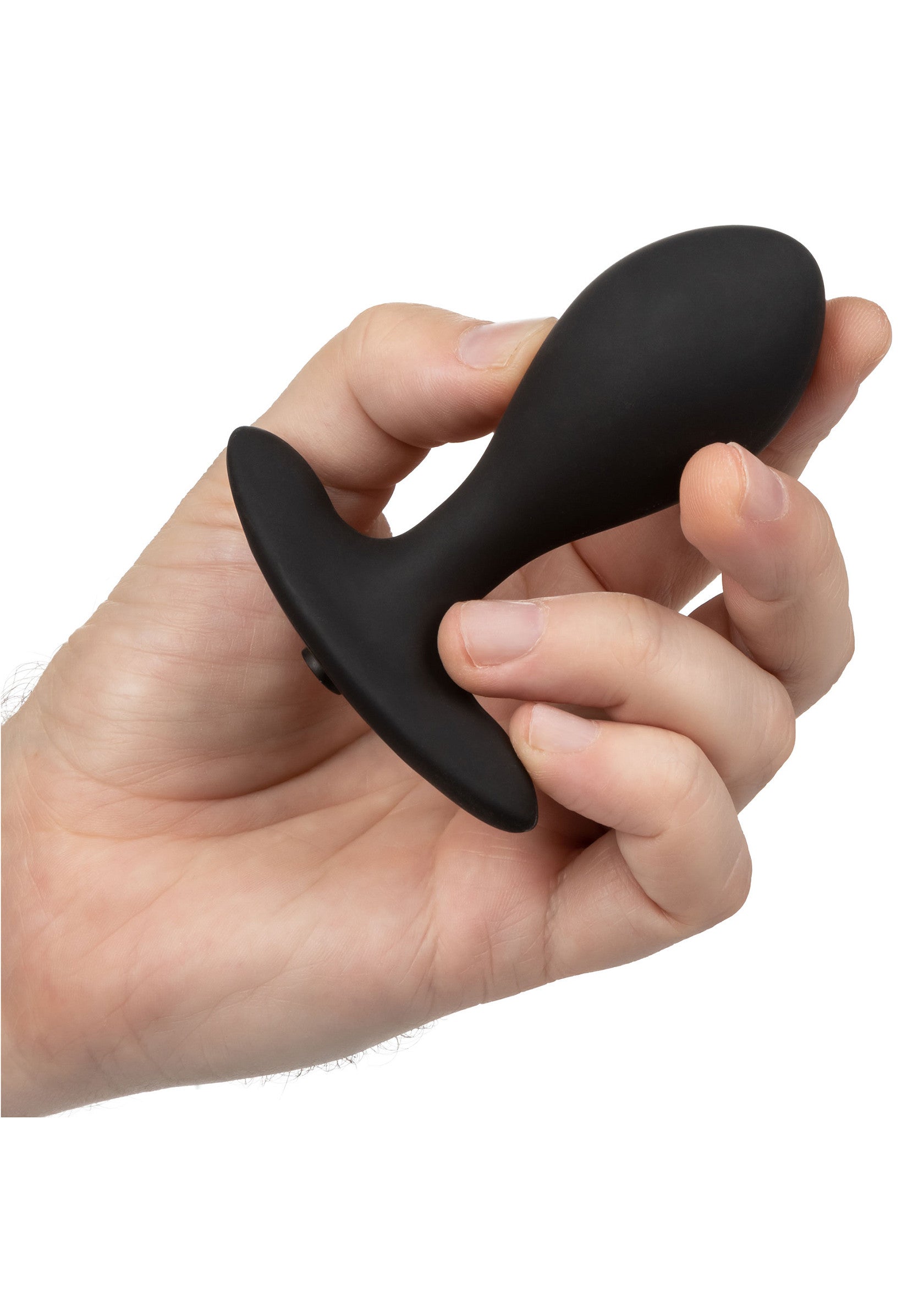 Plug anal noir tenu dans une main. Jouet sexuel pour le plaisir anal, lisse et confortable.; Zwarte buttplug in een hand. Seks speeltje voor anaal genot, glad en comfortabel.; Black butt plug held in hand. Sex toy for anal pleasure, smooth and comfortable.