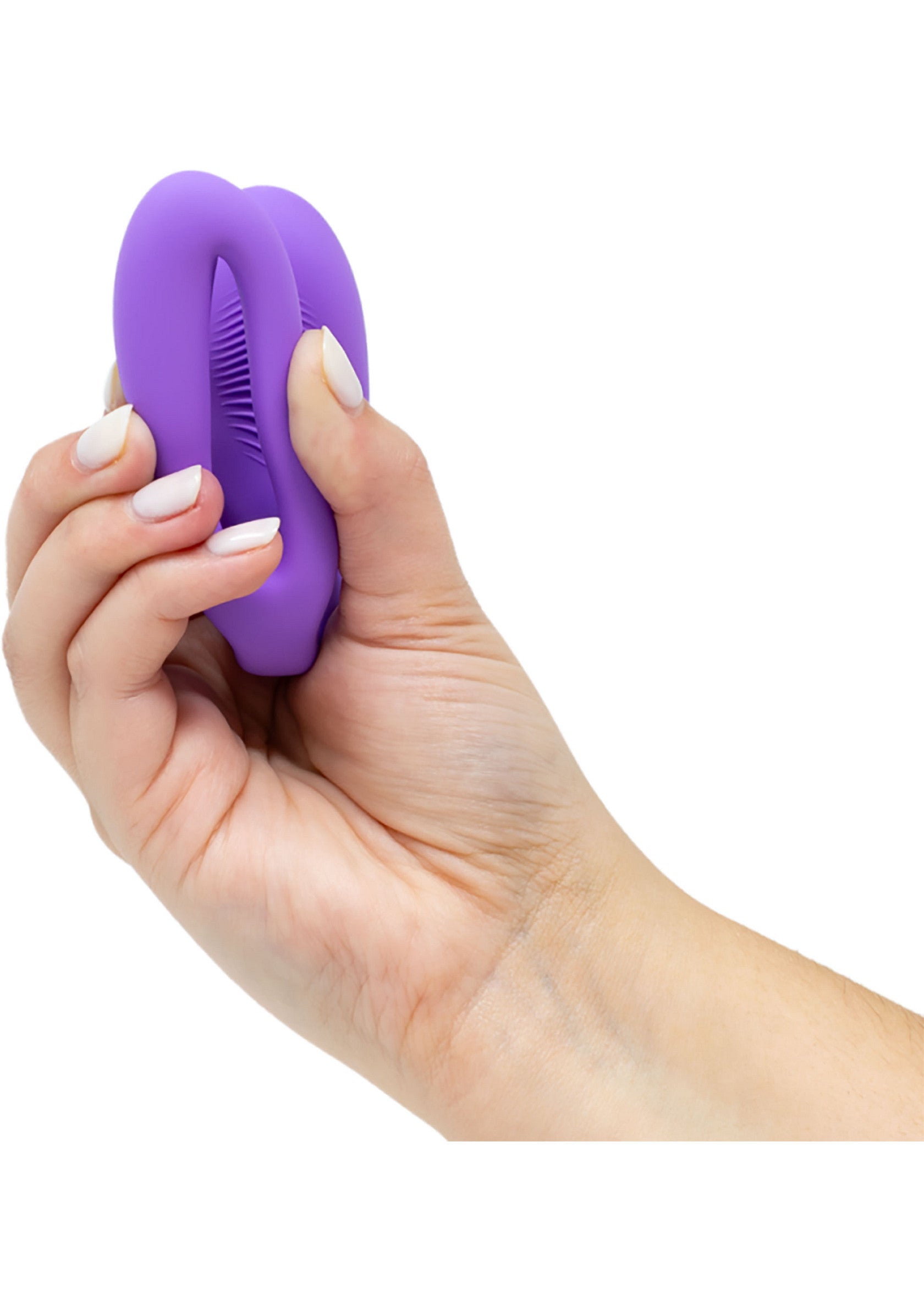 Masseur clitoridien vibrant en silicone violet pour le plaisir féminin.; Paarse vibrerende clitorismassager van siliconen voor vrouwelijk genot.; Purple silicone vibrating clitoral massager for female pleasure.