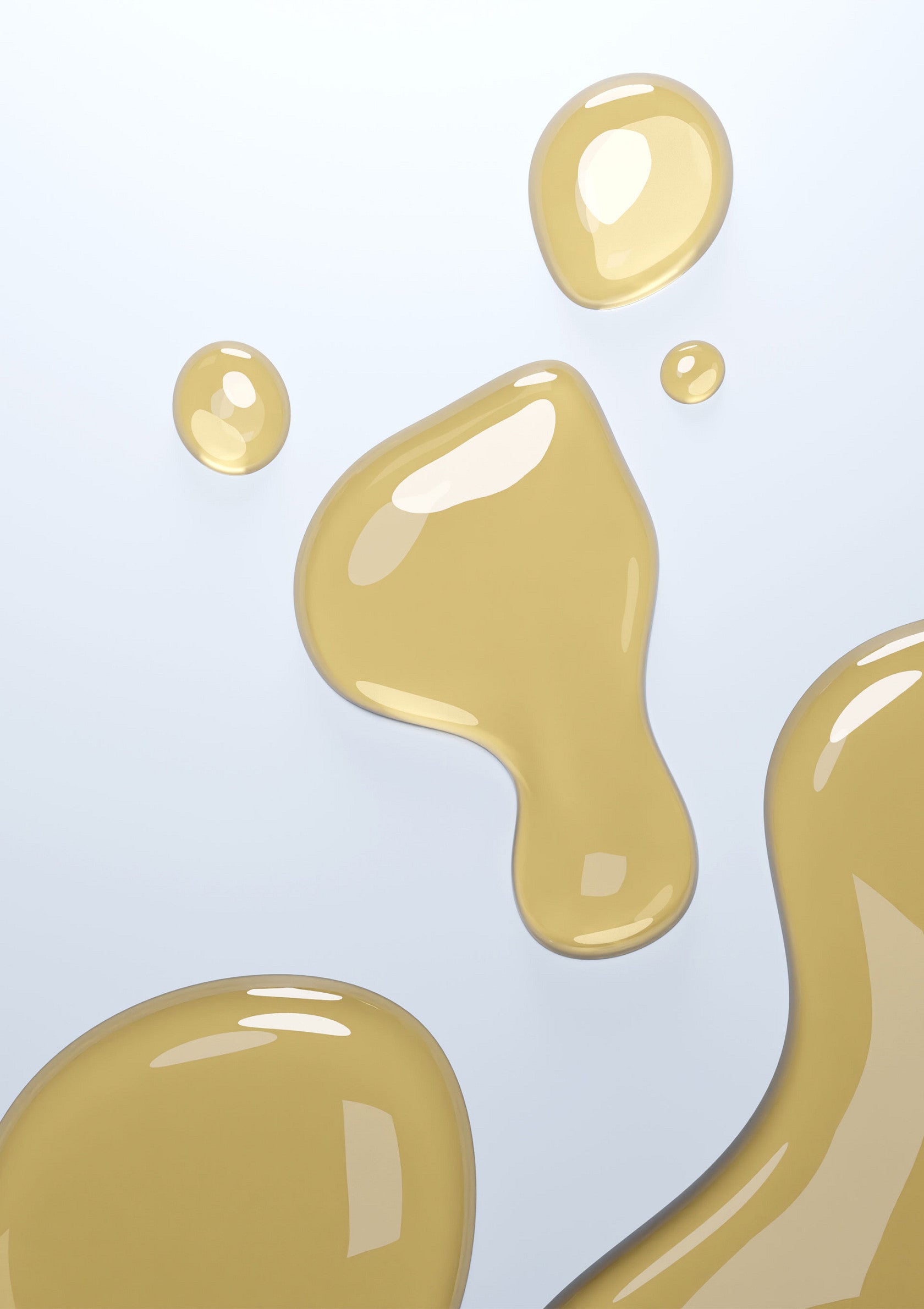 Gouttes d'huile dorée sur fond clair. Idéal pour cosmétiques ou produits de beauté.; Gouden oliedruppels op een heldere achtergrond. Ideaal voor cosmetica of schoonheidsproducten.; Golden oil droplets on a light background. Ideal for cosmetics or beauty products.