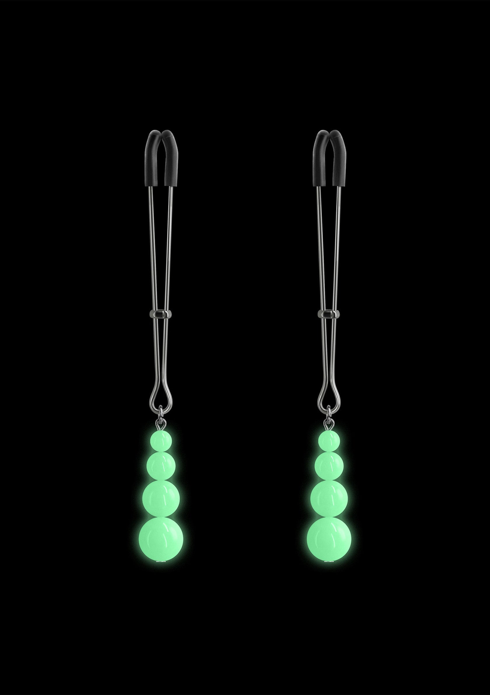 Pinces à tétons à perles phosphorescentes pour des sensations uniques et originales.; Tepelklemmen met glow-in-the-dark kralen voor unieke en spannende sensaties.; Nipple clamps with glow-in-the-dark beads for unique and exciting sensations.