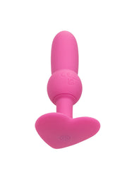 Plug anal rose en forme de cœur pour une expérience sensuelle et ludique.; Roze anaalplug in hartvorm voor een sensuele en speelse ervaring.; Pink heart-shaped butt plug for a sensual and playful experience.
