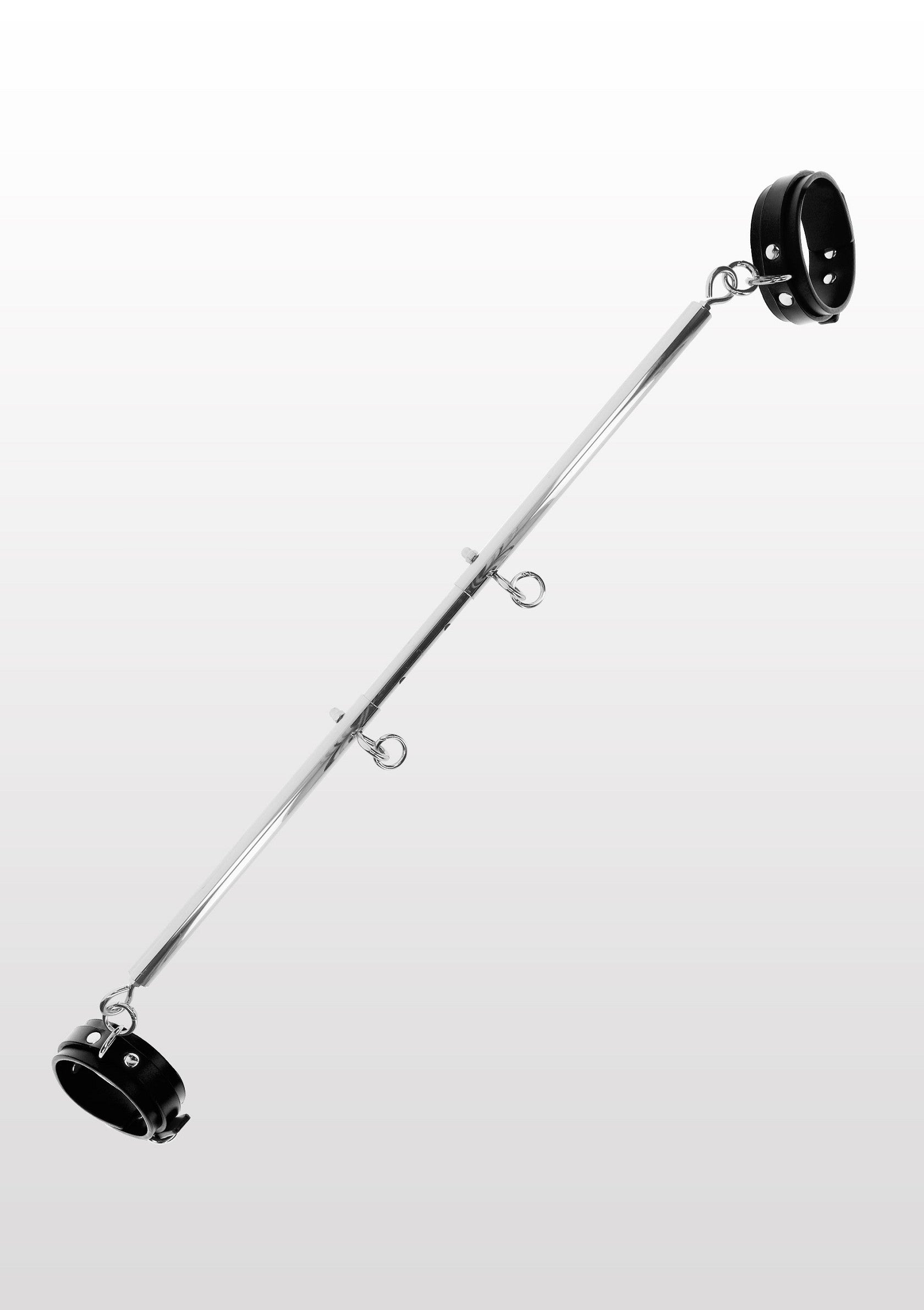 Barre d'écartement en acier inoxydable avec manchettes rembourrées pour une soumission complète.; Roestvrijstalen spreidstang met gevoerde manchetten voor totale onderwerping.; Stainless steel spreader bar with padded cuffs for total submission.