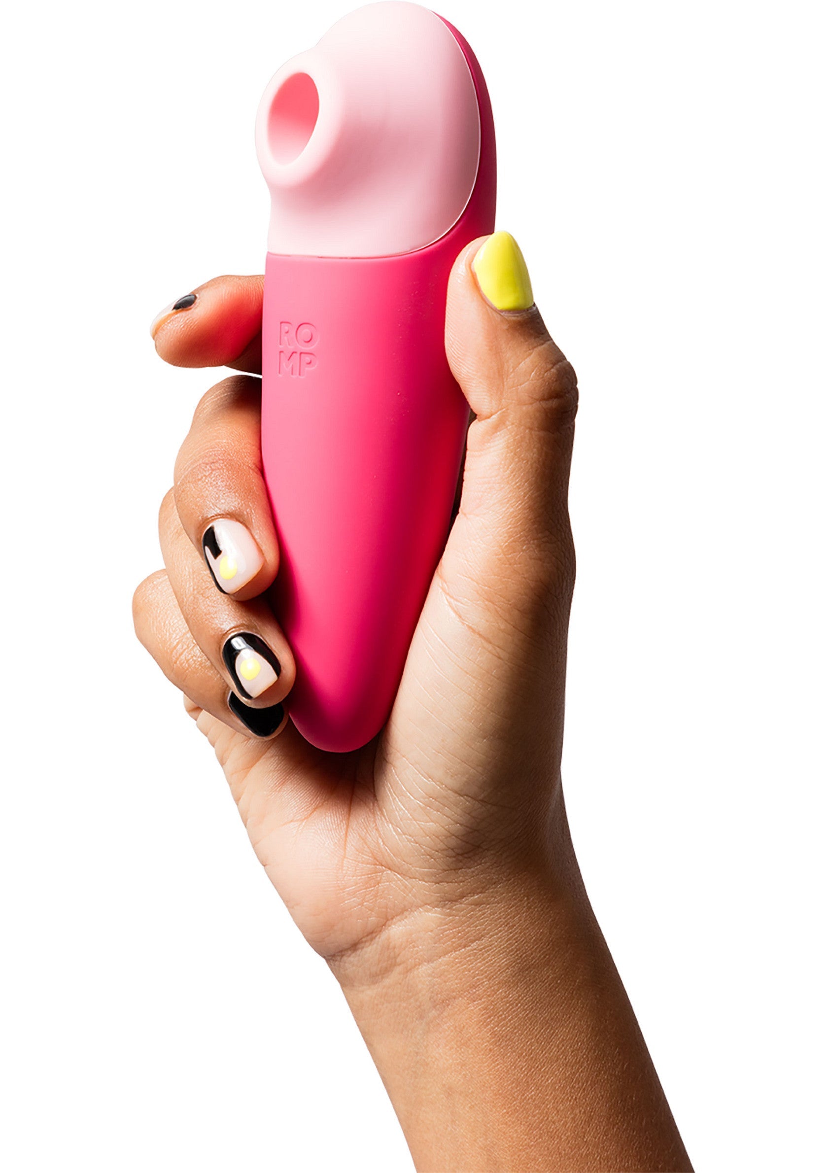 Masseur clitoridien rose dans une main. Plaisir ciblé pour des orgasmes intenses. ; Roze clitorismassager in een hand. Gerichte stimulatie voor intense orgasmes. ; Pink clitoral stimulator in hand. Targeted pleasure for intense orgasms. 