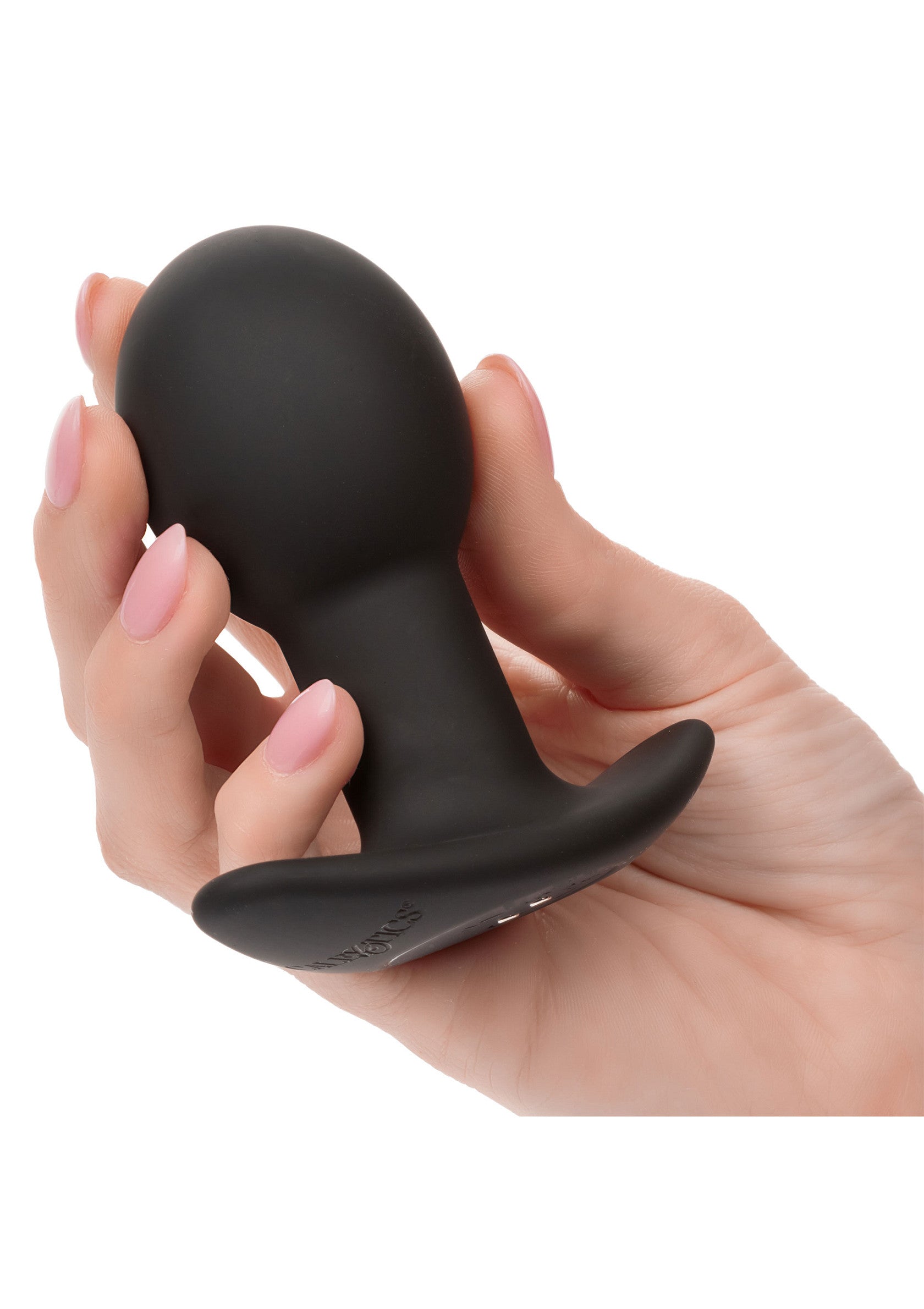 Plug anal noir lisse tenu dans une main, idéal pour les débutants et les amateurs de plaisir.; Gladde zwarte anale plug in een hand, ideaal voor beginners en liefhebbers van plezier.; Smooth black butt plug held in a hand, perfect for beginners and pleasure seekers.